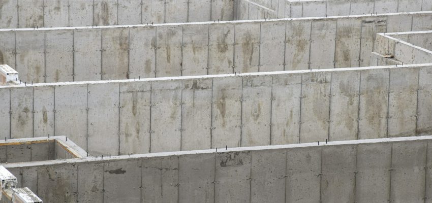 Concrete walls of basement foundation at a construction site